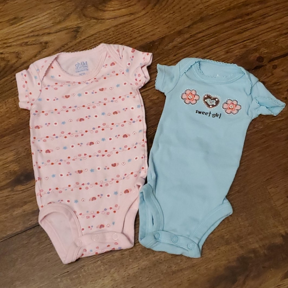 Girls flowers and hearts onesies size NB
